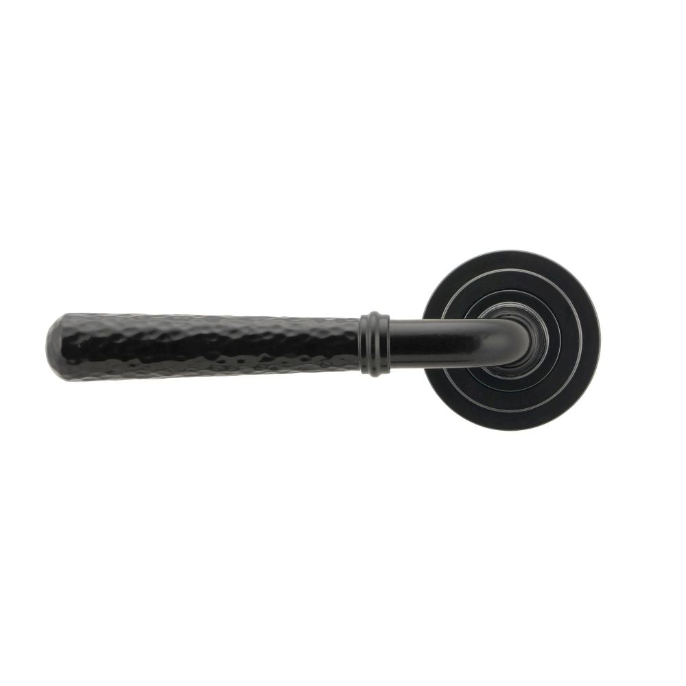 This is an image showing From The Anvil - Black Hammered Newbury Lever on Rose Set (Art Deco) - Unsprung available from trade door handles, quick delivery and discounted prices