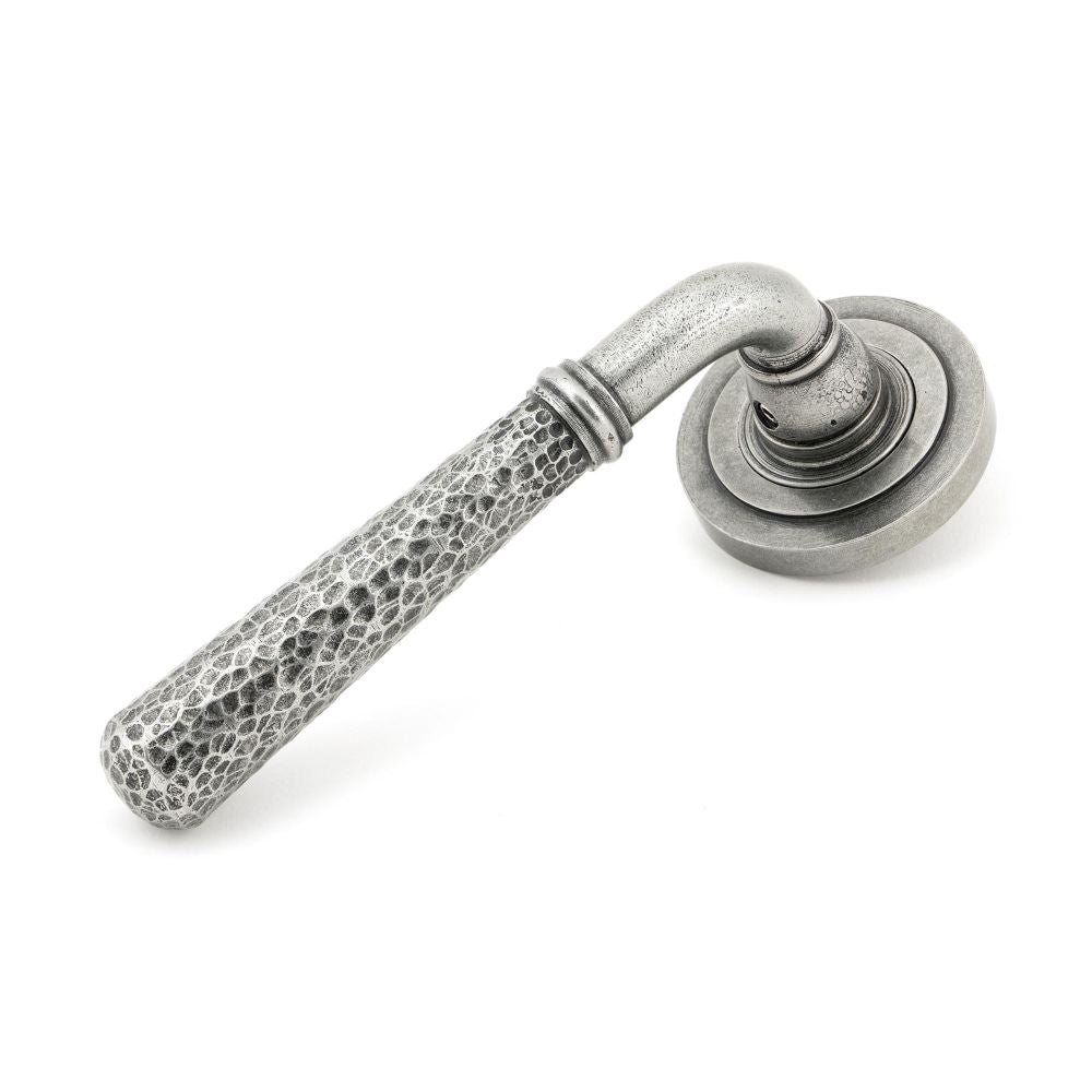 This is an image showing From The Anvil - Pewter Hammered Newbury Lever on Rose Set (Art Deco) - Unsprung available from trade door handles, quick delivery and discounted prices