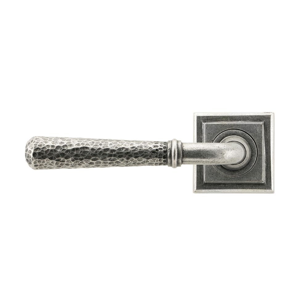 This is an image showing From The Anvil - Pewter Hammered Newbury Lever on Rose Set (Square) - Unsprung available from trade door handles, quick delivery and discounted prices