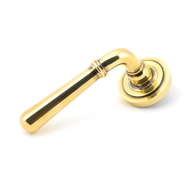 This is an image showing From The Anvil - Aged Brass Newbury Lever on Rose Set (Art Deco) - Unsprung available from trade door handles, quick delivery and discounted prices