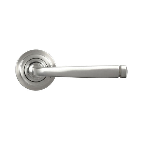 This is an image showing From The Anvil - Satin Marine SS (316) Avon Round Lever on Rose Set (Art Deco) - available from trade door handles, quick delivery and discounted prices