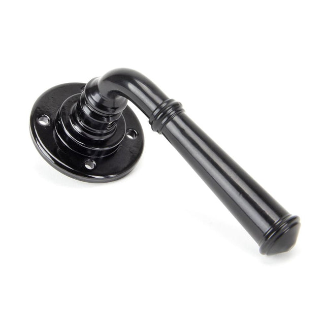 This is an image showing From The Anvil - Black Regency Lever on Rose Set - Unsprung available from trade door handles, quick delivery and discounted prices