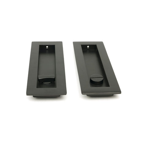 This is an image showing From The Anvil - Aged Bronze 175mm Plain Rectangular Pull - Privacy Set available from trade door handles, quick delivery and discounted prices