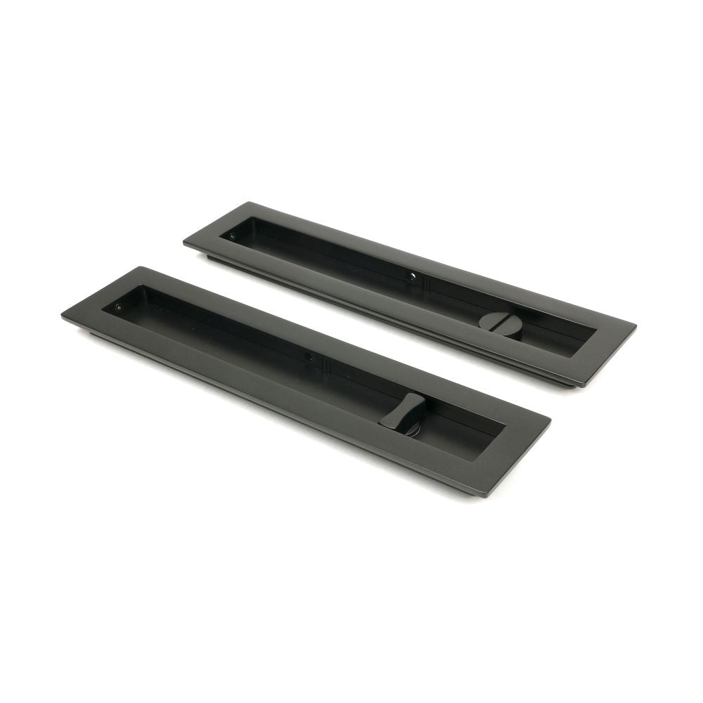 This is an image showing From The Anvil - Aged Bronze 250mm Plain Rectangular Pull - Privacy Set available from trade door handles, quick delivery and discounted prices