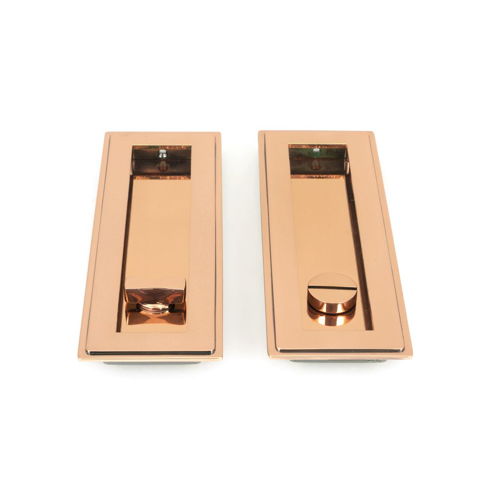 This is an image showing From The Anvil - Polished Bronze 175mm Art Deco Rectangular Pull -Privacy Set available from trade door handles, quick delivery and discounted prices