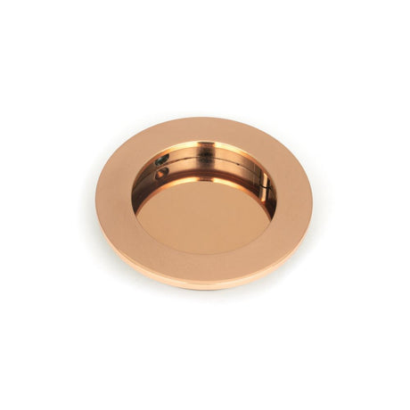 This is an image showing From The Anvil - Polished Bronze 75mm Plain Round Pull available from trade door handles, quick delivery and discounted prices
