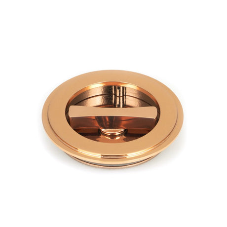 This is an image showing From The Anvil - Polished Bronze 75mm Art Deco Round Pull - Privacy Set available from trade door handles, quick delivery and discounted prices