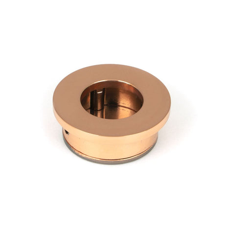 This is an image showing From The Anvil - Polished Bronze 34mm Round Finger Edge Pull available from trade door handles, quick delivery and discounted prices