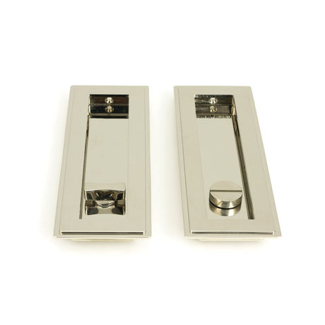 This is an image showing From The Anvil - Polished Nickel 175mm Art Deco Rectangular Pull -Privacy Set available from trade door handles, quick delivery and discounted prices