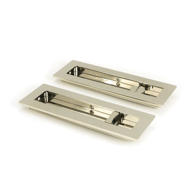 This is an image showing From The Anvil - Polished Nickel 175mm Plain Rectangular Pull - Privacy Set available from trade door handles, quick delivery and discounted prices