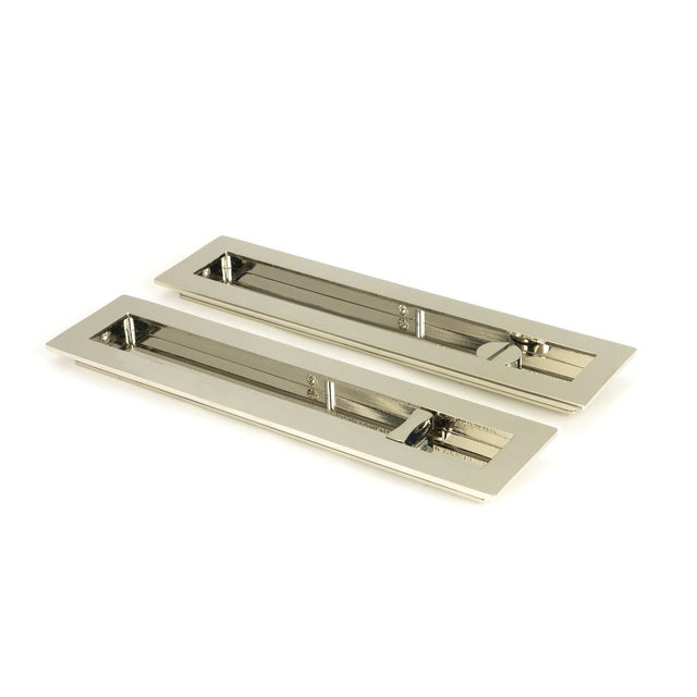 This is an image showing From The Anvil - Polished Nickel 250mm Plain Rectangular Pull - Privacy Set available from trade door handles, quick delivery and discounted prices