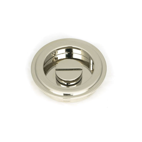 This is an image showing From The Anvil - Polished Nickel 60mm Art Deco Round Pull - Privacy Set available from trade door handles, quick delivery and discounted prices