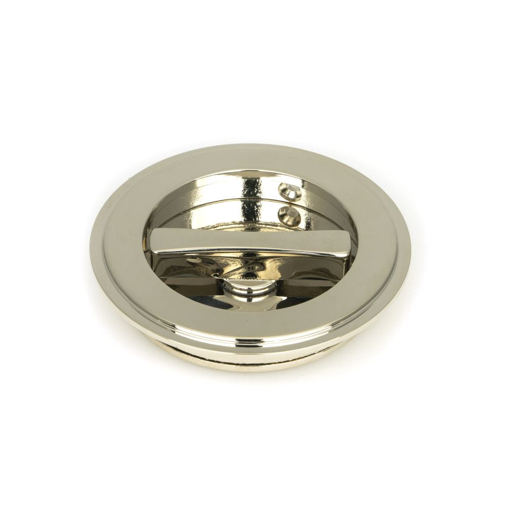 This is an image showing From The Anvil - Polished Nickel 75mm Art Deco Round Pull - Privacy Set available from trade door handles, quick delivery and discounted prices