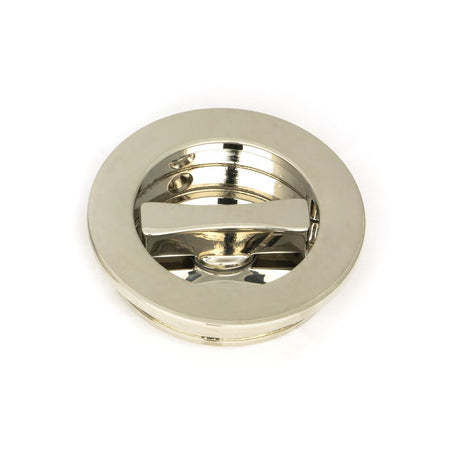 This is an image showing From The Anvil - Polished Nickel 60mm Plain Round Pull - Privacy Set available from trade door handles, quick delivery and discounted prices