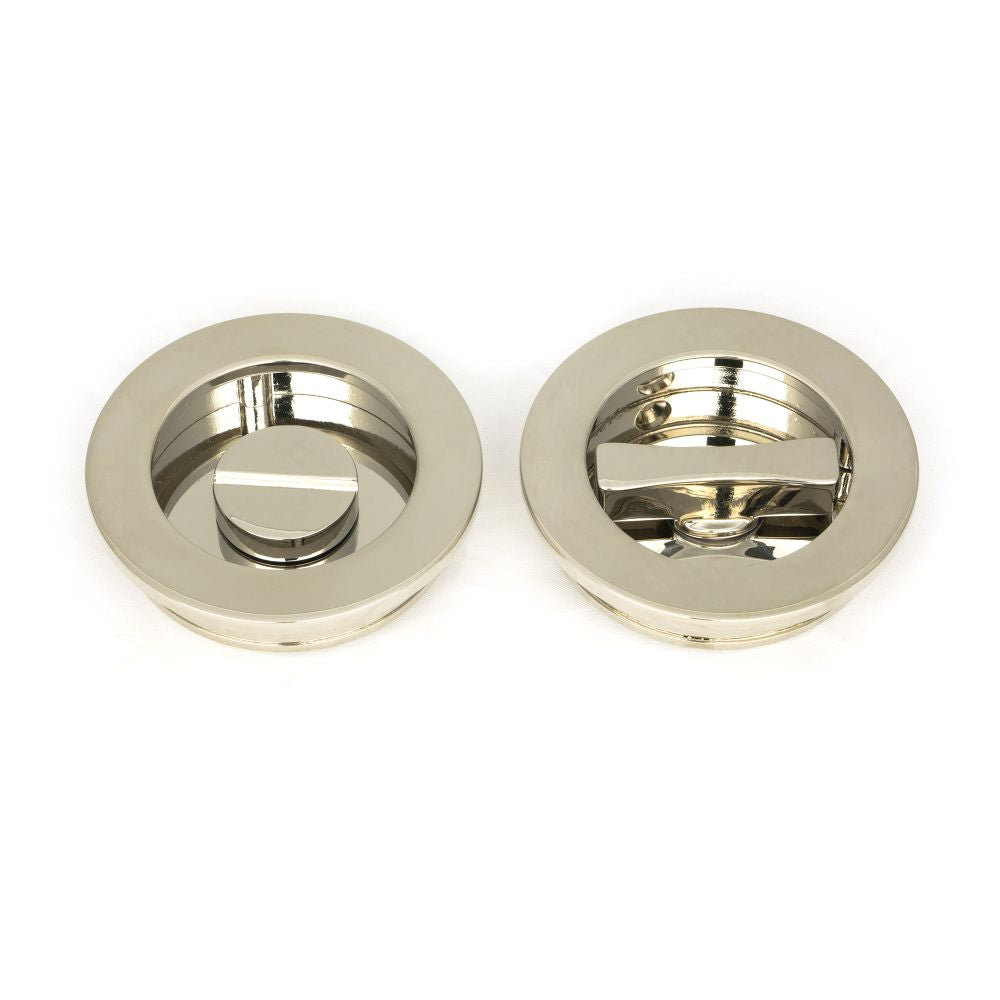 This is an image showing From The Anvil - Polished Nickel 60mm Plain Round Pull - Privacy Set available from trade door handles, quick delivery and discounted prices