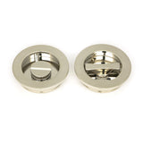 This is an image showing From The Anvil - Polished Nickel 60mm Plain Round Pull - Privacy Set available from trade door handles, quick delivery and discounted prices