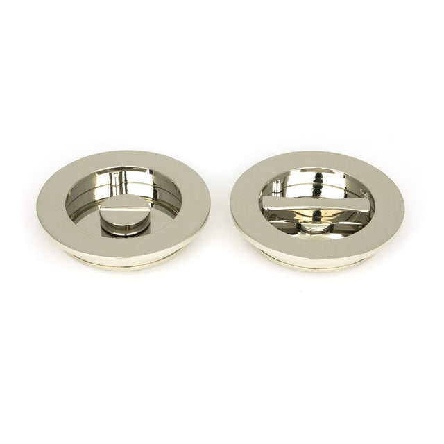 This is an image showing From The Anvil - Polished Nickel 75mm Plain Round Pull - Privacy Set available from trade door handles, quick delivery and discounted prices