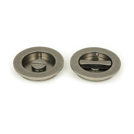 This is an image showing From The Anvil - Pewter 75mm Plain Round Pull - Privacy Set available from trade door handles, quick delivery and discounted prices