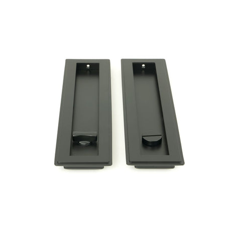 This is an image showing From The Anvil - Matt Black 250mm Art Deco Rectangular Pull - Privacy Set available from trade door handles, quick delivery and discounted prices