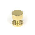 This is an image showing From The Anvil - Polished Brass Kelso Cabinet Knob - 25mm (Plain) available from trade door handles, quick delivery and discounted prices