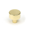 This is an image showing From The Anvil - Polished Brass Kelso Cabinet Knob - 25mm (No Rose) available from trade door handles, quick delivery and discounted prices