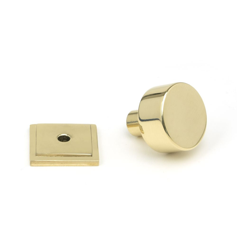 This is an image showing From The Anvil - Polished Brass Kelso Cabinet Knob - 25mm (Square) available from trade door handles, quick delivery and discounted prices