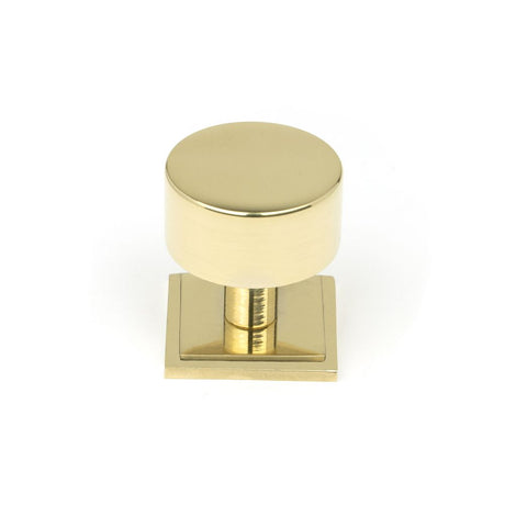 This is an image showing From The Anvil - Polished Brass Kelso Cabinet Knob - 32mm (Square) available from trade door handles, quick delivery and discounted prices