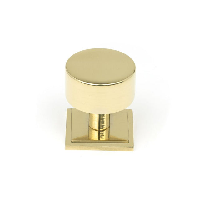 This is an image showing From The Anvil - Polished Brass Kelso Cabinet Knob - 32mm (Square) available from trade door handles, quick delivery and discounted prices