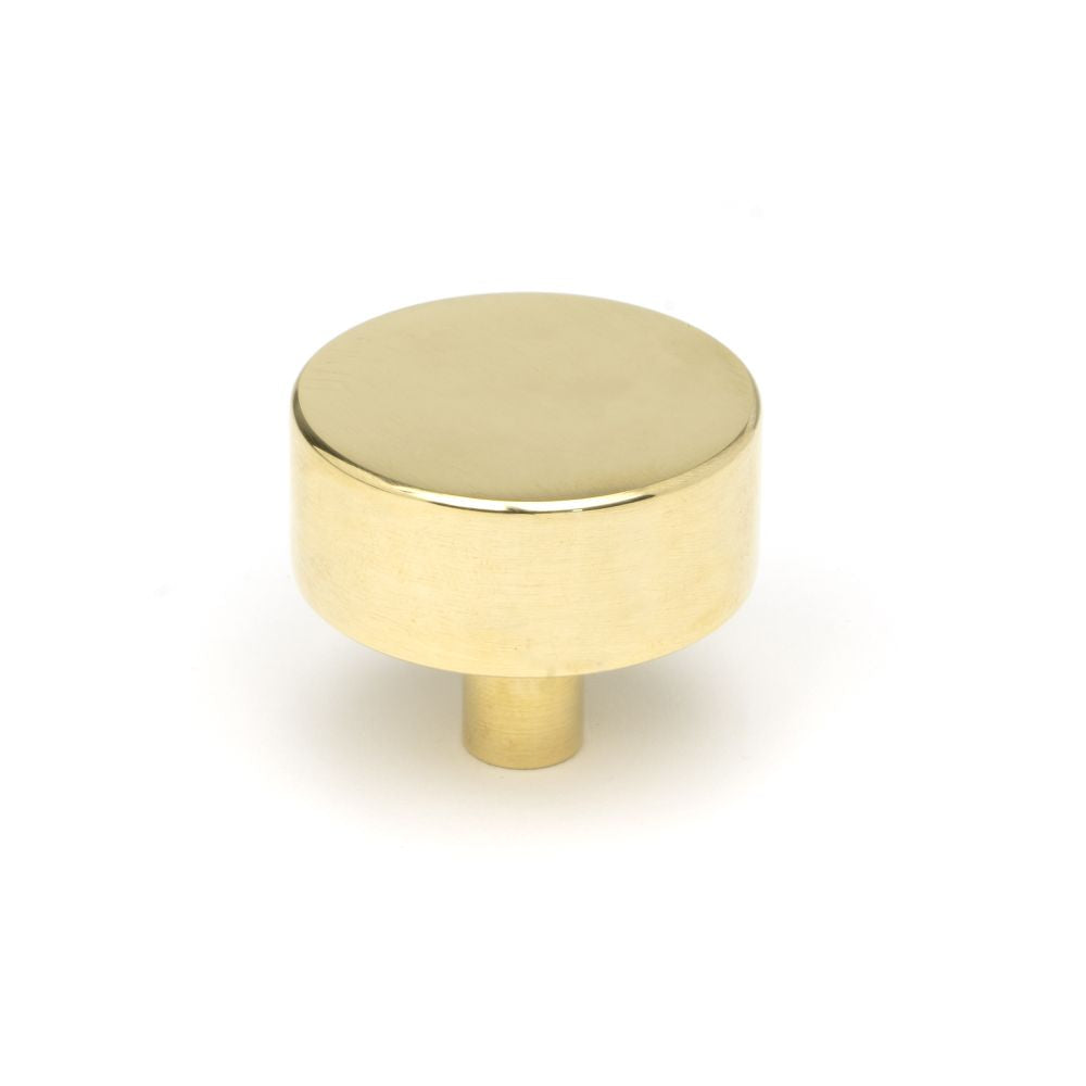 This is an image showing From The Anvil - Polished Brass Kelso Cabinet Knob - 38mm (No Rose) available from trade door handles, quick delivery and discounted prices