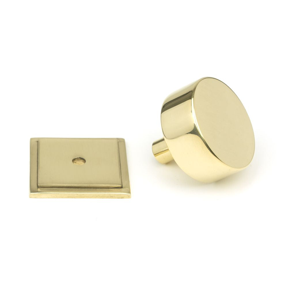 This is an image showing From The Anvil - Polished Brass Kelso Cabinet Knob - 38mm (Square) available from trade door handles, quick delivery and discounted prices