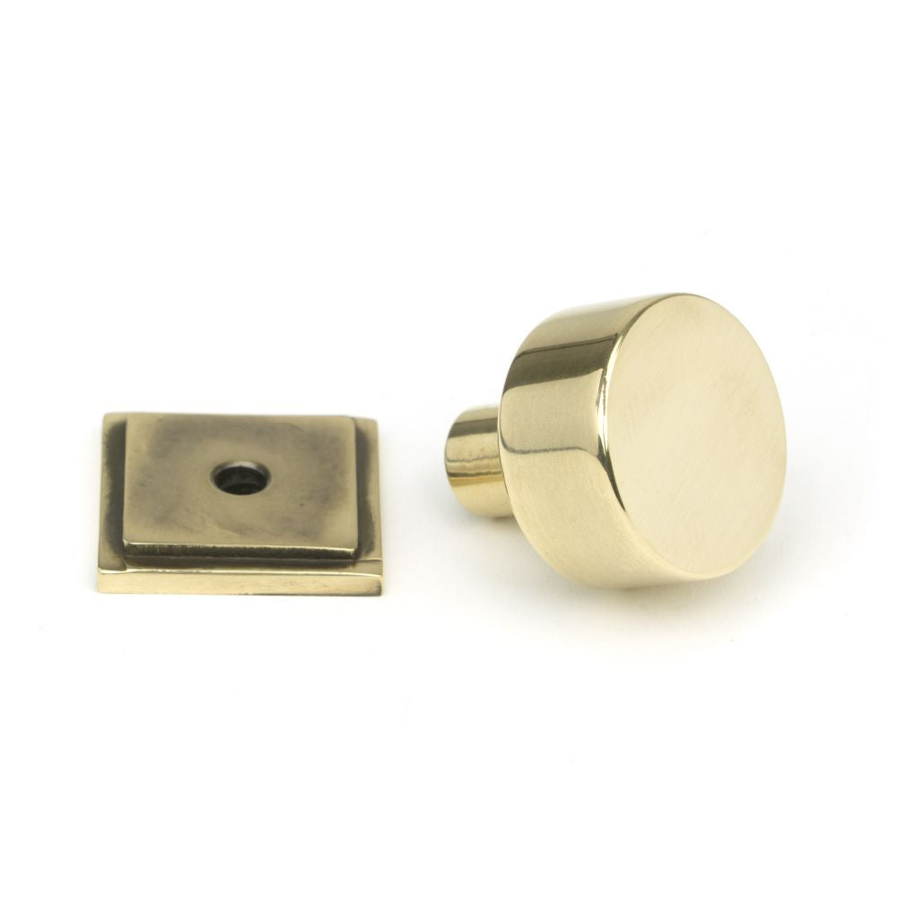 This is an image showing From The Anvil - Aged Brass Kelso Cabinet Knob - 25mm (Square) available from trade door handles, quick delivery and discounted prices