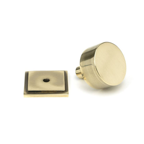 This is an image showing From The Anvil - Aged Brass Kelso Cabinet Knob - 32mm (Square) available from trade door handles, quick delivery and discounted prices