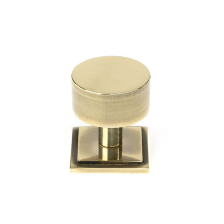 This is an image showing From The Anvil - Aged Brass Kelso Cabinet Knob - 32mm (Square) available from trade door handles, quick delivery and discounted prices