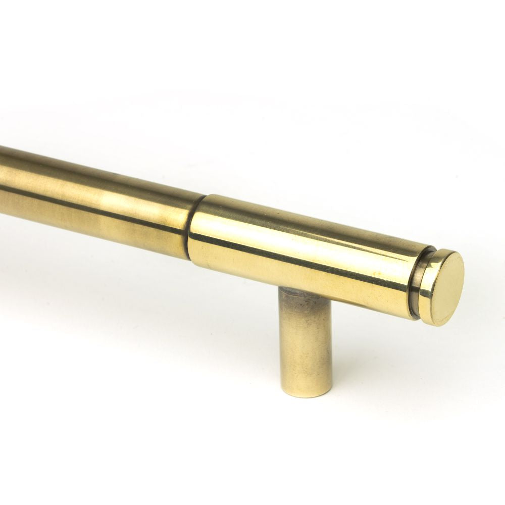 This is an image showing From The Anvil - Aged Brass Kelso Pull Handle - Small available from trade door handles, quick delivery and discounted prices