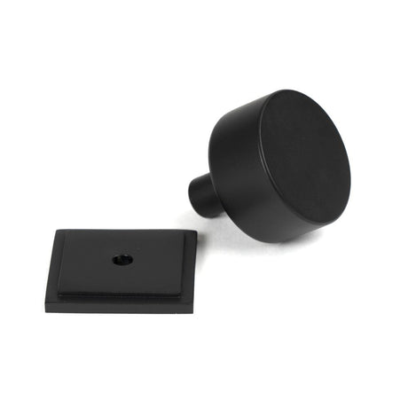 This is an image showing From The Anvil - Matt Black Kelso Cabinet Knob - 32mm (Square) available from trade door handles, quick delivery and discounted prices