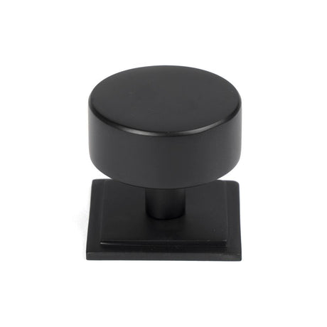 This is an image showing From The Anvil - Matt Black Kelso Cabinet Knob - 38mm (Square) available from trade door handles, quick delivery and discounted prices