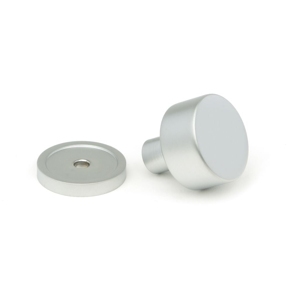 This is an image showing From The Anvil - Satin Chrome Kelso Cabinet Knob - 25mm (Plain) available from trade door handles, quick delivery and discounted prices