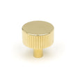 This is an image showing From The Anvil - Polished Brass Judd Cabinet Knob - 32mm (No Rose) available from trade door handles, quick delivery and discounted prices