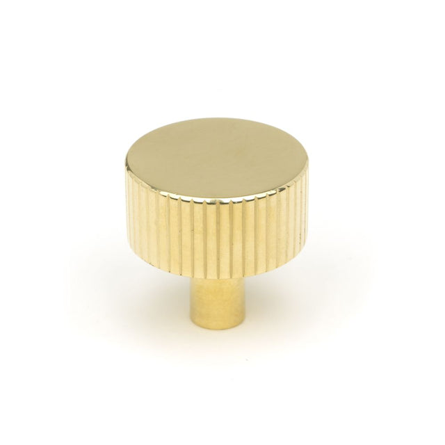 This is an image showing From The Anvil - Polished Brass Judd Cabinet Knob - 32mm (No Rose) available from trade door handles, quick delivery and discounted prices