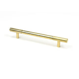 This is an image showing From The Anvil - Polished Brass Judd Pull Handle - Medium available from trade door handles, quick delivery and discounted prices