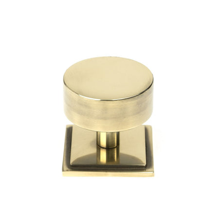 This is an image showing From The Anvil - Aged Brass Kelso Cabinet Knob - 38mm (Square) available from trade door handles, quick delivery and discounted prices