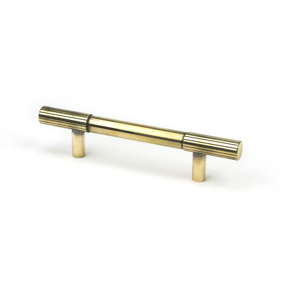 This is an image showing From The Anvil - Aged Brass Judd Pull Handle - Small available from trade door handles, quick delivery and discounted prices