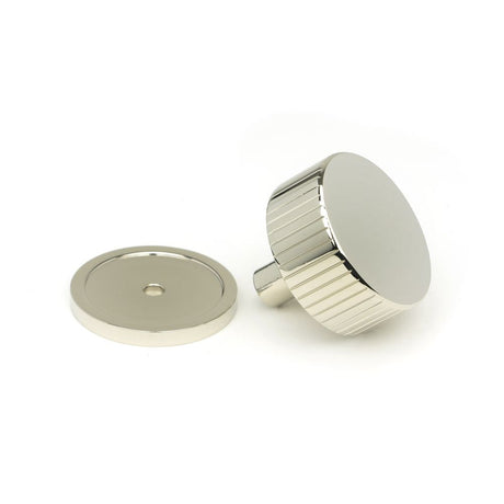 This is an image showing From The Anvil - Polished Nickel Judd Cabinet Knob - 38mm (Plain) available from trade door handles, quick delivery and discounted prices