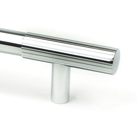 This is an image showing From The Anvil - Polished Chrome Judd Pull Handle - Small available from trade door handles, quick delivery and discounted prices