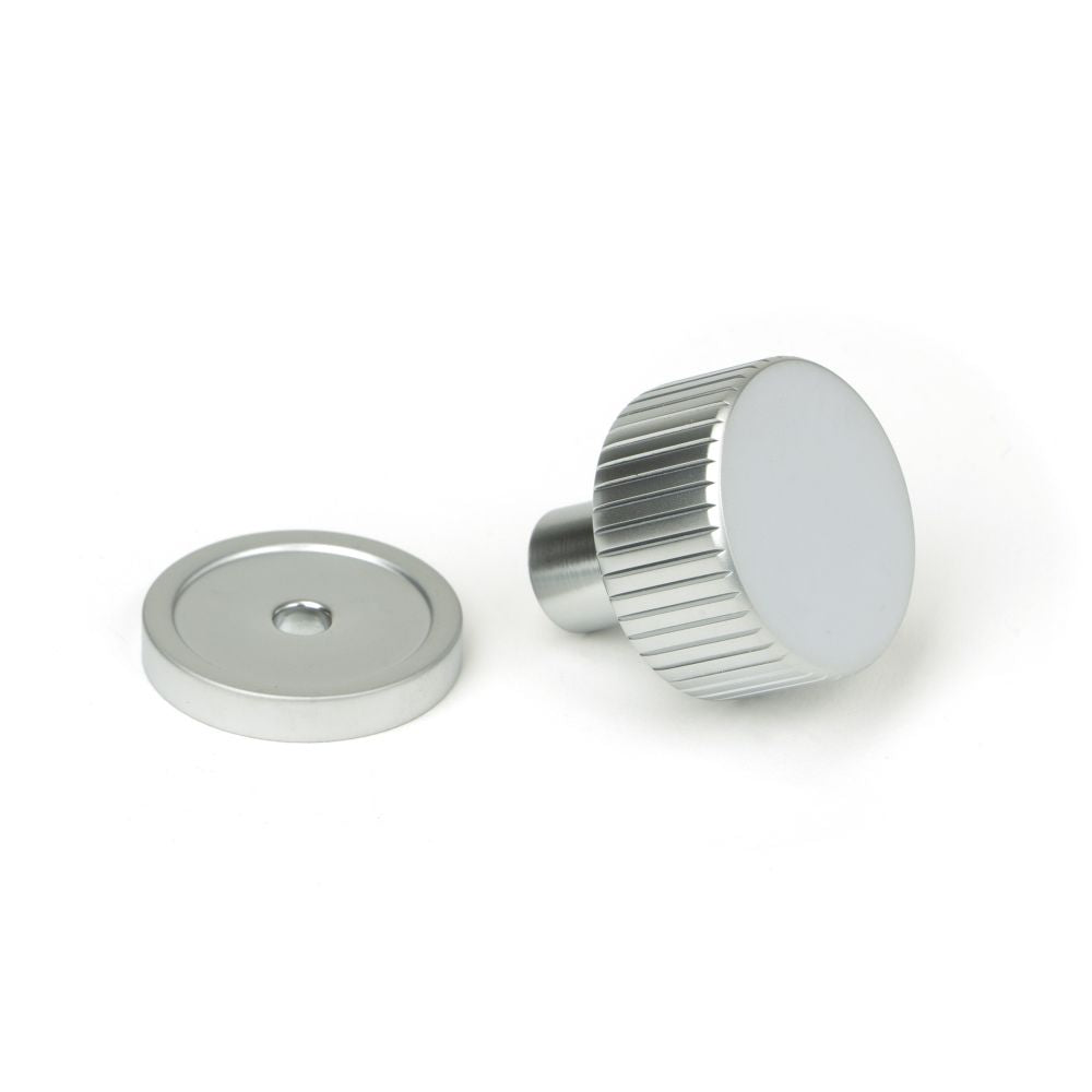 This is an image showing From The Anvil - Satin Chrome Judd Cabinet Knob - 25mm (Plain) available from trade door handles, quick delivery and discounted prices