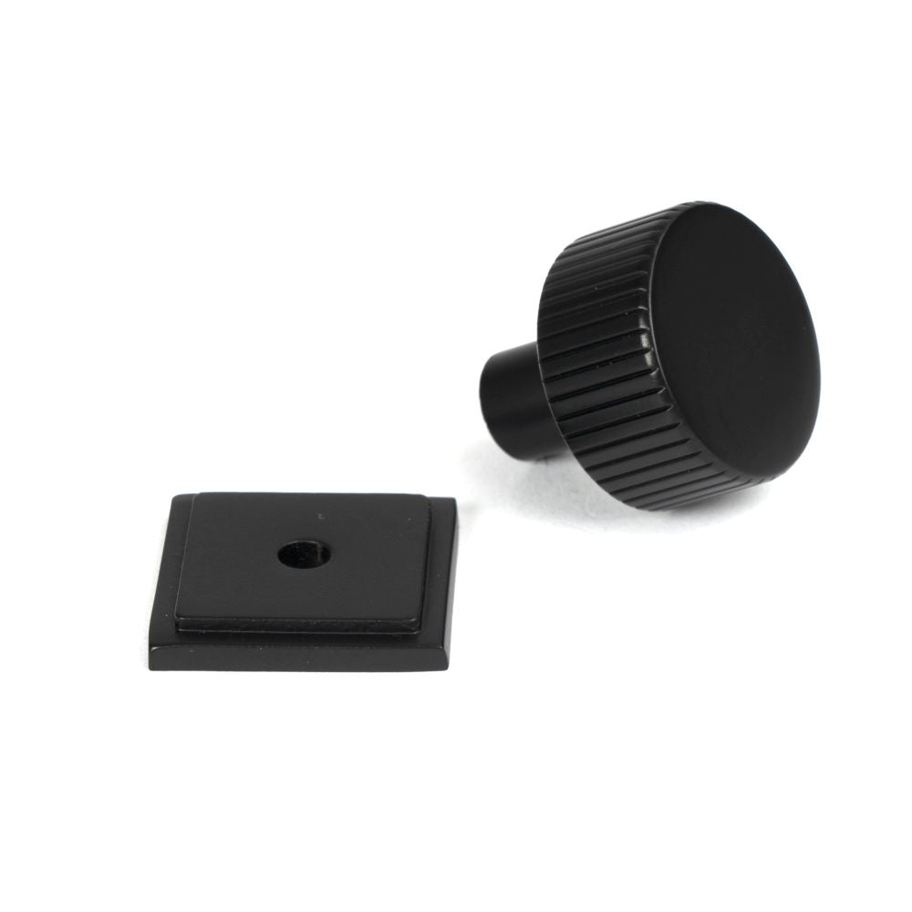 This is an image showing From The Anvil - Matt Black Judd Cabinet Knob - 25mm (Square) available from trade door handles, quick delivery and discounted prices