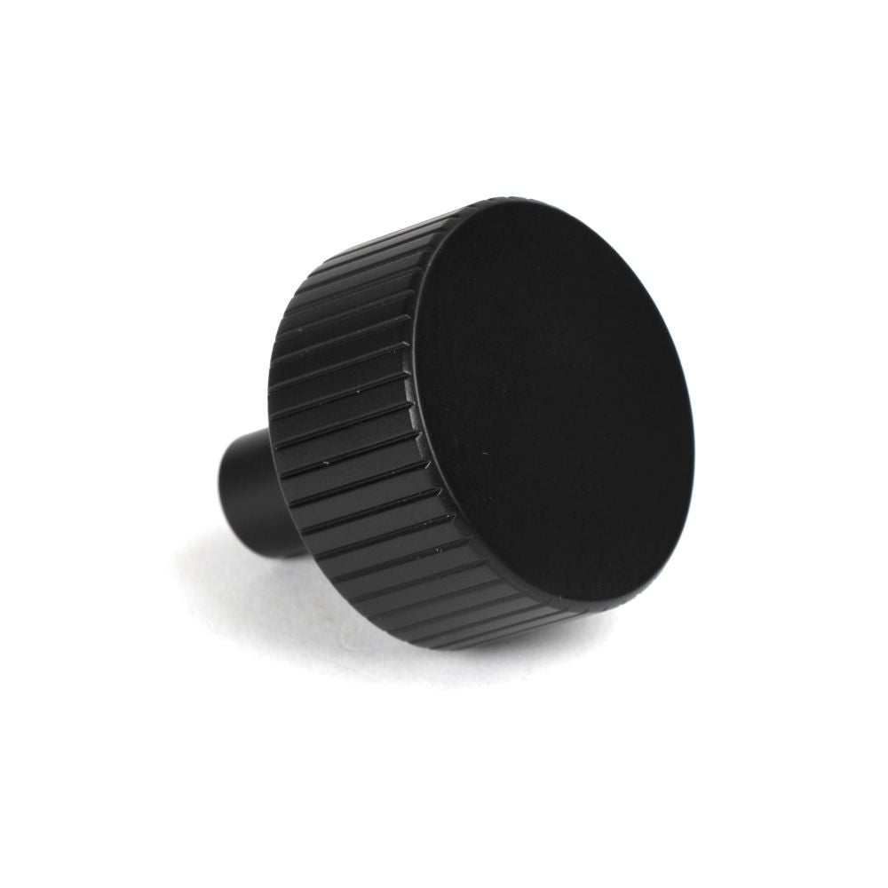 This is an image showing From The Anvil - Matt Black Judd Cabinet Knob - 32mm (No rose) available from trade door handles, quick delivery and discounted prices