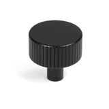 This is an image showing From The Anvil - Matt Black Judd Cabinet Knob - 32mm (No rose) available from trade door handles, quick delivery and discounted prices