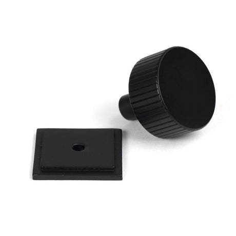 This is an image showing From The Anvil - Matt Black Judd Cabinet Knob - 32mm (Square) available from trade door handles, quick delivery and discounted prices