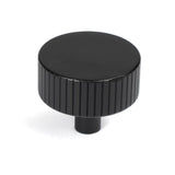 This is an image showing From The Anvil - Matt Black Judd Cabinet Knob - 38mm (No rose) available from trade door handles, quick delivery and discounted prices